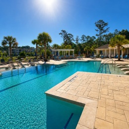 clear pool with a cabana